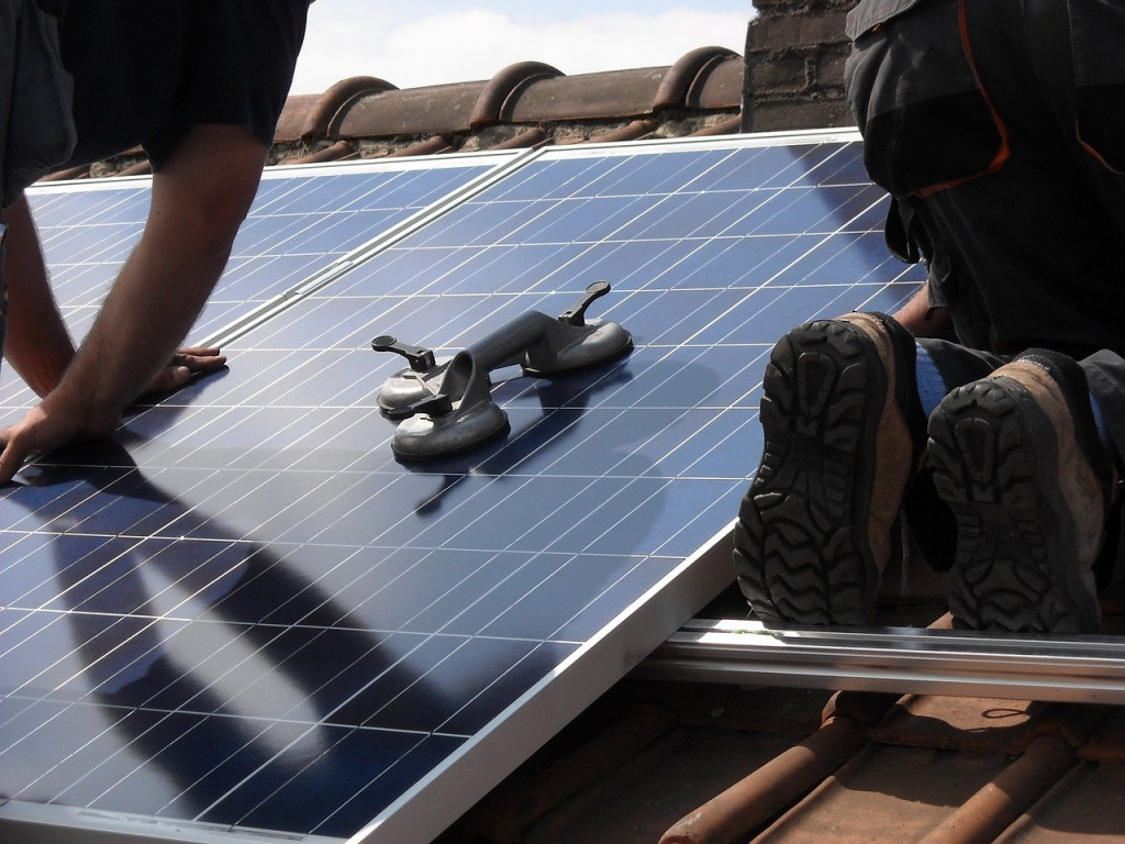 Glue solar panel to rv 2025 roof